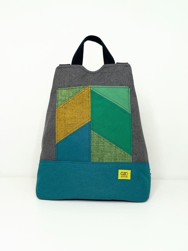 mochila antirrobo artesanal en tonos verdes